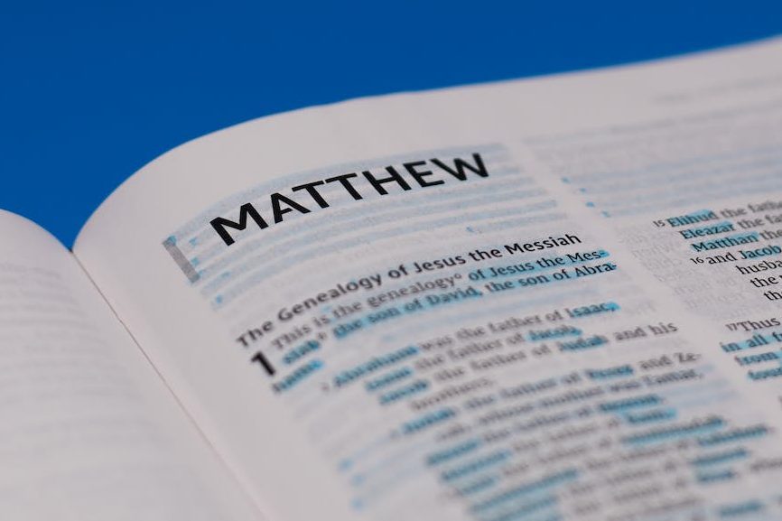 A bible opened up to the book of Matthew